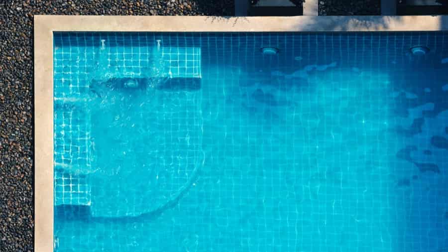 Swimming pool with spa jets and bubble bath features
